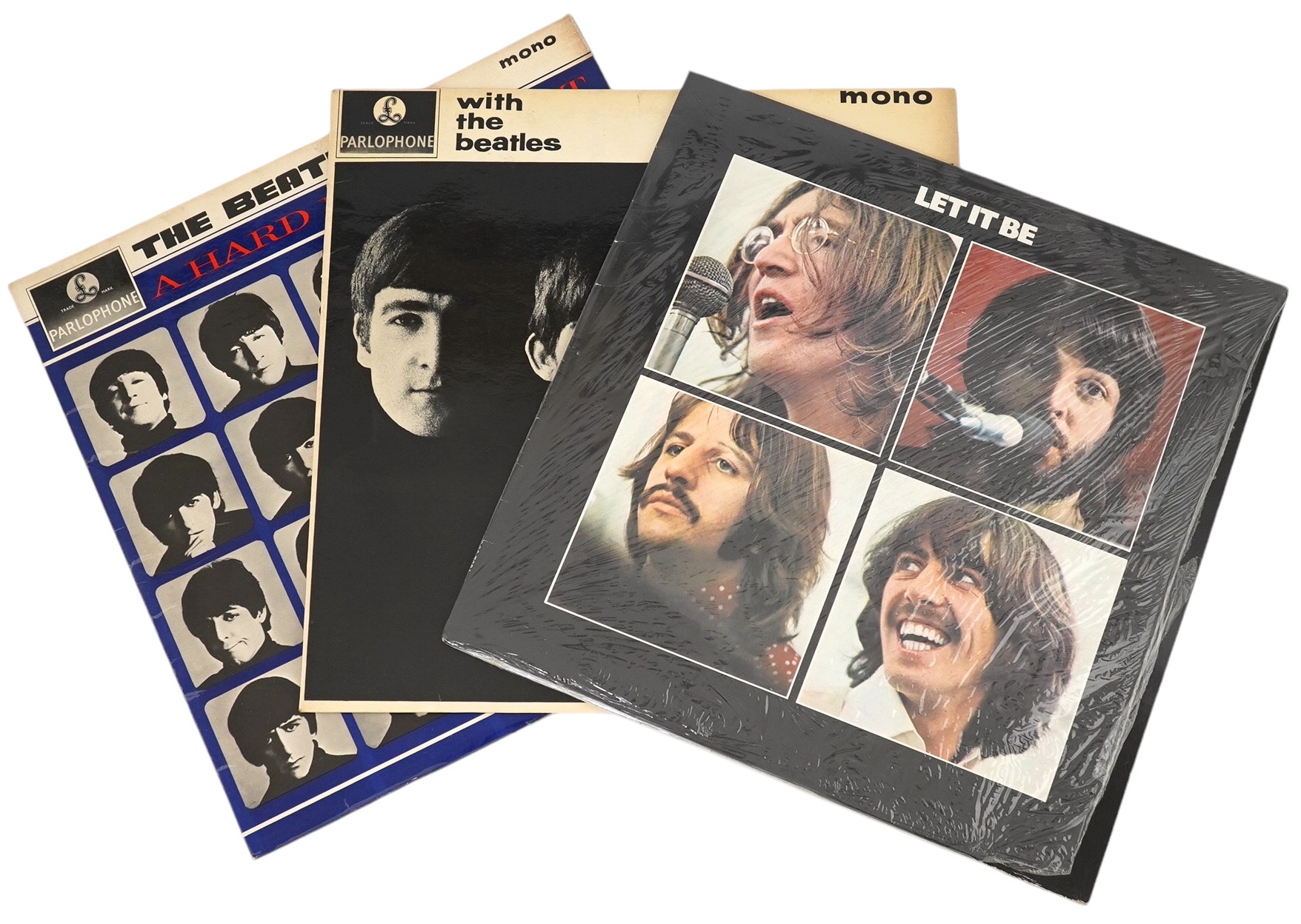 Three The Beatles LP record albums; Let It Be, PCS7096, With The Beatles, PMC 1206, XEX 447-1N, A Hard Days Night, PMC 1230, XEX 481-3N. Condition - fair to good